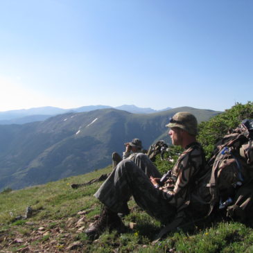 guys-sitting-on-mountainside