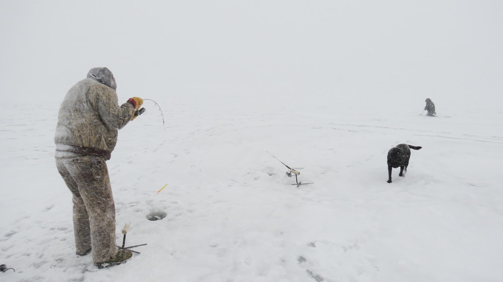 ice-fishing-in-blizzard